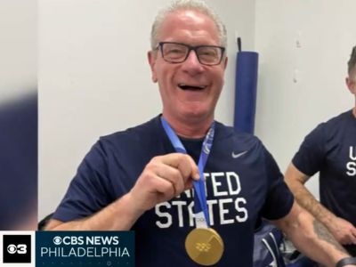 John Worley, USA Men's Hockey Athletic Trainer with Gold Medal
