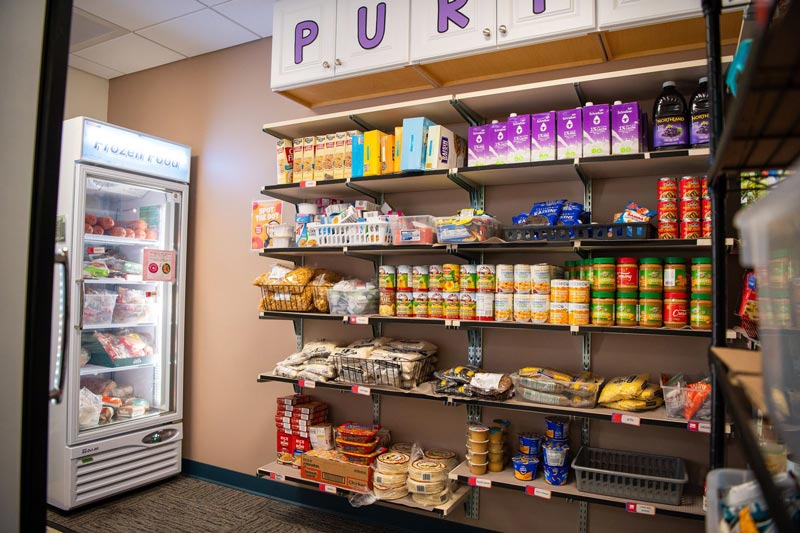 food items stored on shelves and in a freezer in the WCU Resource Pantry