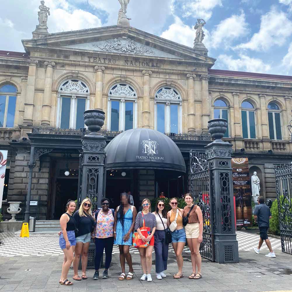 Students posing in front of Teatro Nacional in Costa Rica