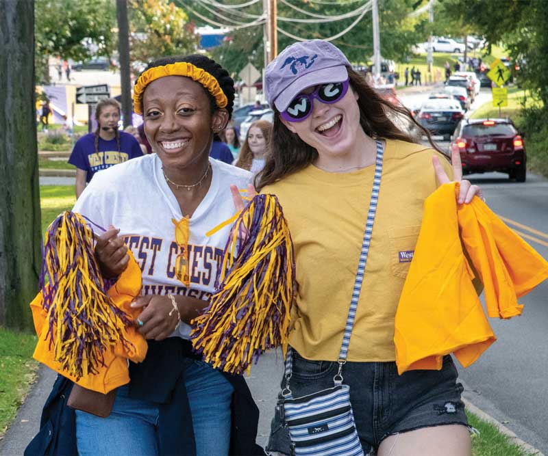 2 students decked out in West Chester University gear