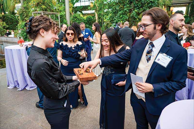 Gala guests help themselves to hors d'oeuvres