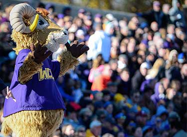 Rammy the mascot greeting crowd